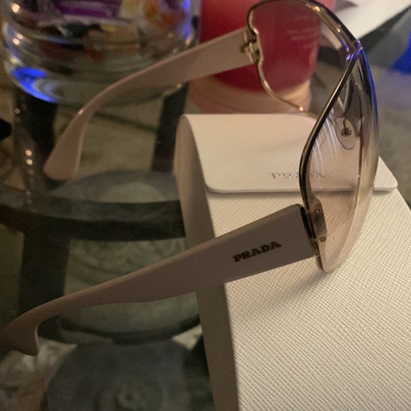 Prada Shades and they have some scratches on them.Prada sell replacement.$60-80. - Picture 3 of 3